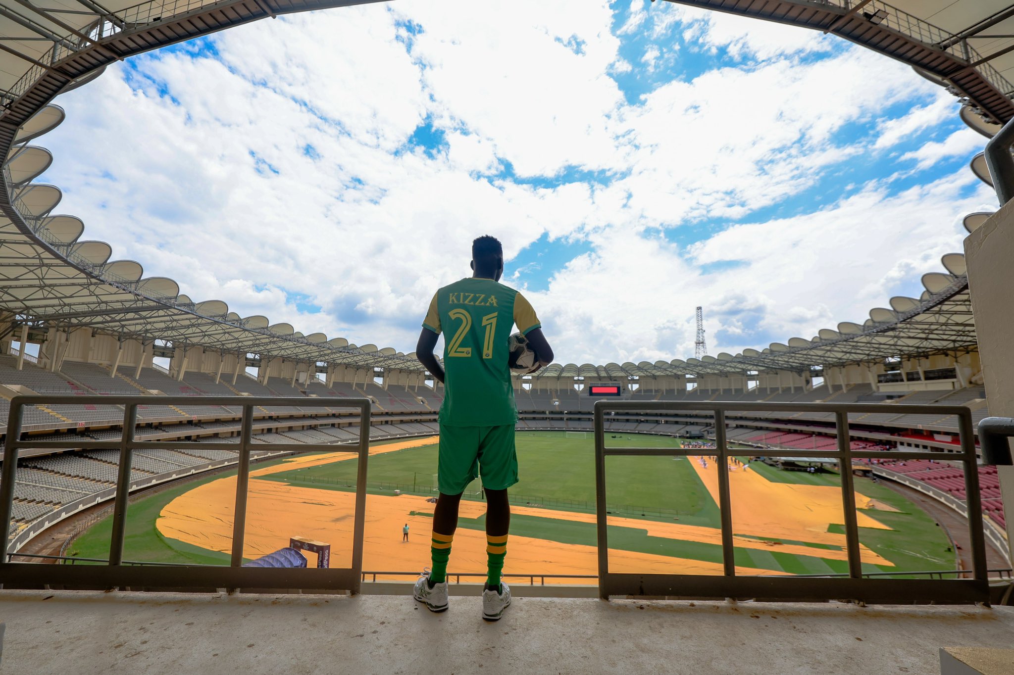 Kizza posing for a photo at the Nyayo Stadium in Kenya