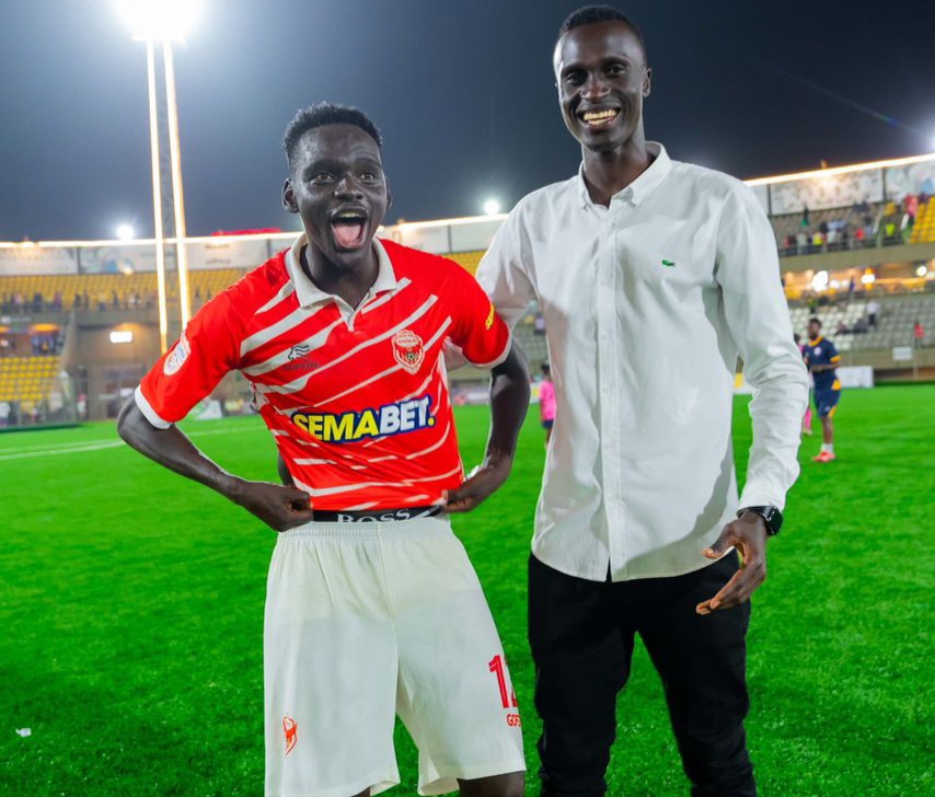 (Wilfred Mudanya with a west Nile player Mustafa Kizza)