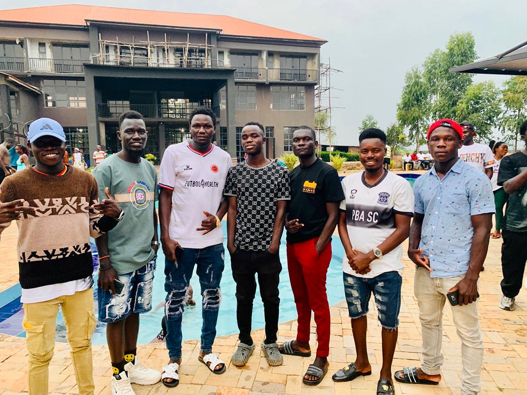 Greater Nebbi Football Fans members having a good time at their get together party last year