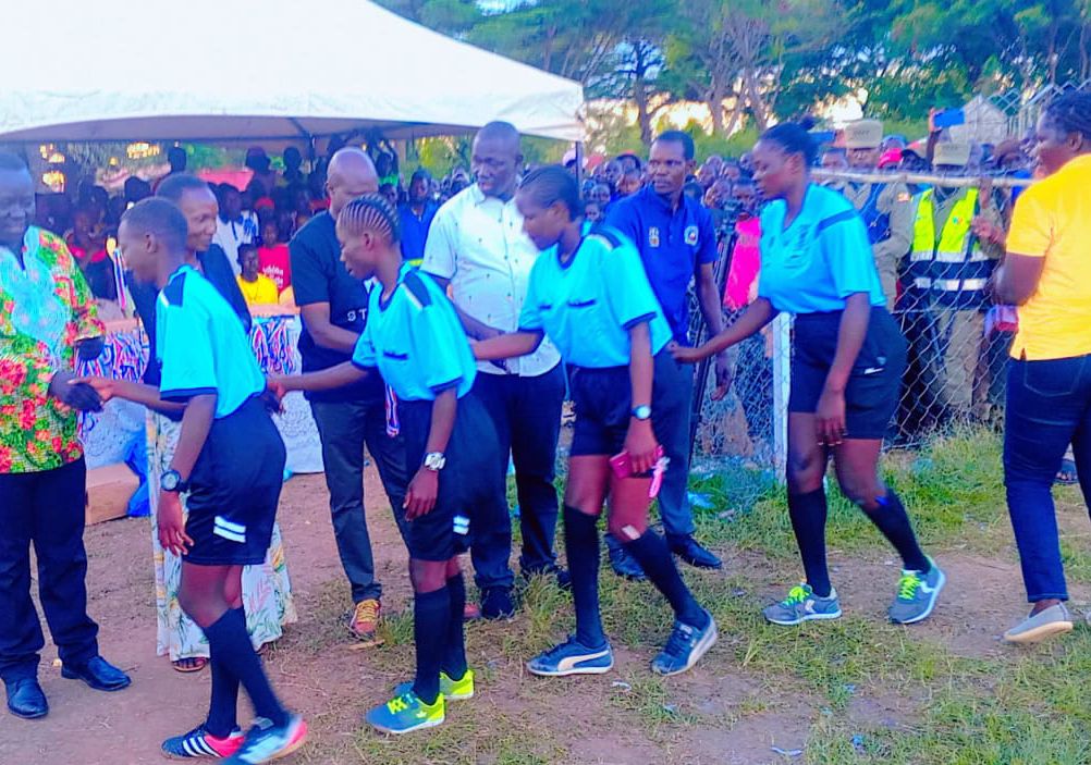 L-R Brenda Kwioncwiny, Peptra, Kevin and Trinity the match officials for girls football final