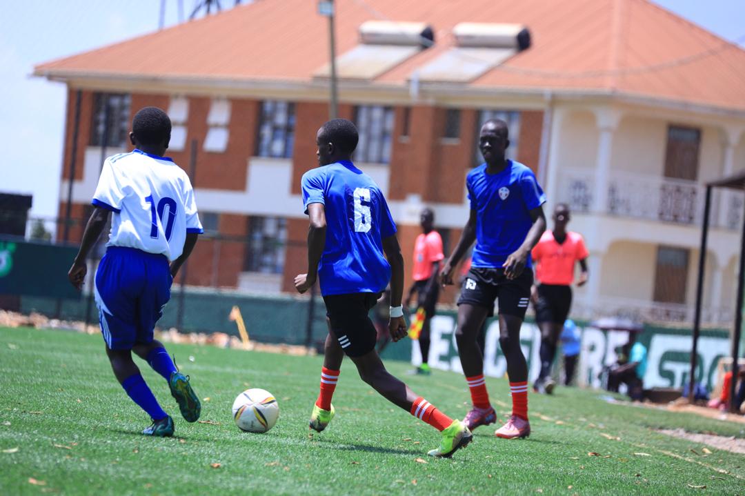 Charles Ocen (shirt 6 ) in action .