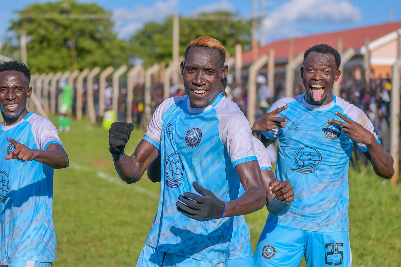 (Olaboro Lawrence (center) celebrating with team mates)