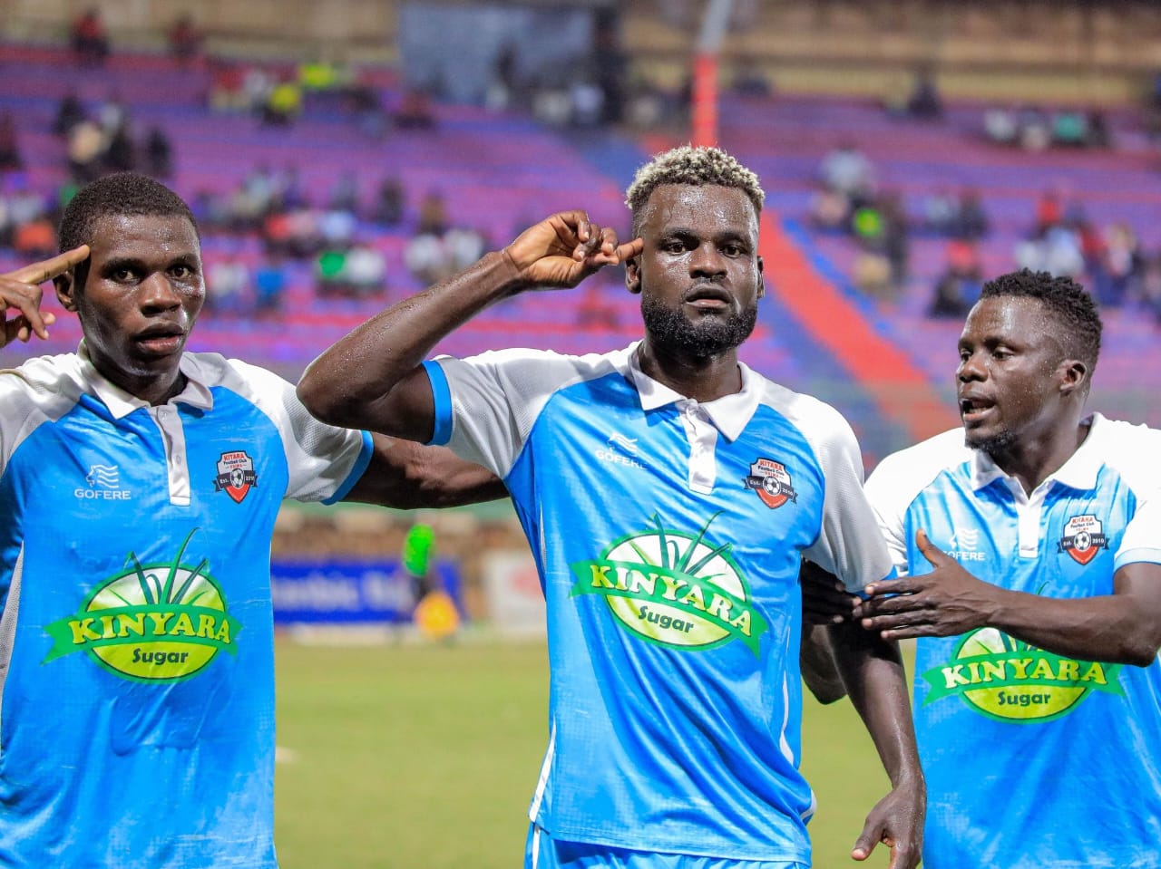 Wahab (middle) celebrating with his teammates