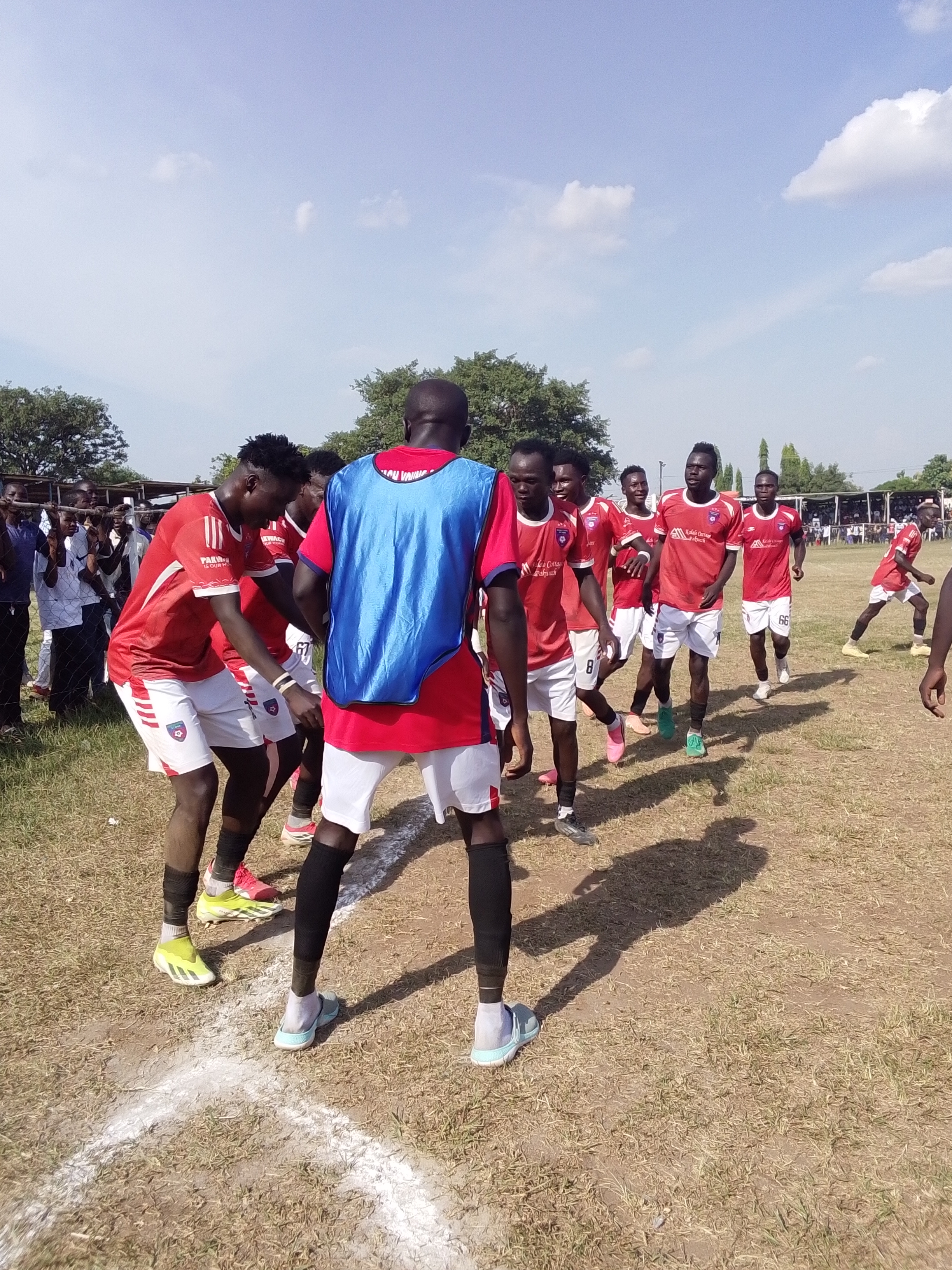 Okumu Victor ( Second goal scorer) celebrating with his teammates 