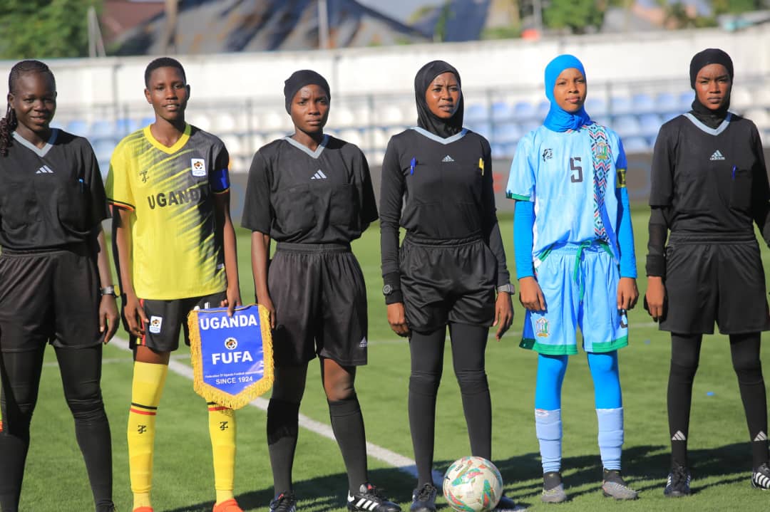 Vicky with referees on the opening match against Djibouti