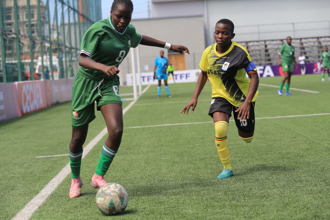 Capain Justine Ayerango closes on a Kenyan opponent in the Semi-Final Match