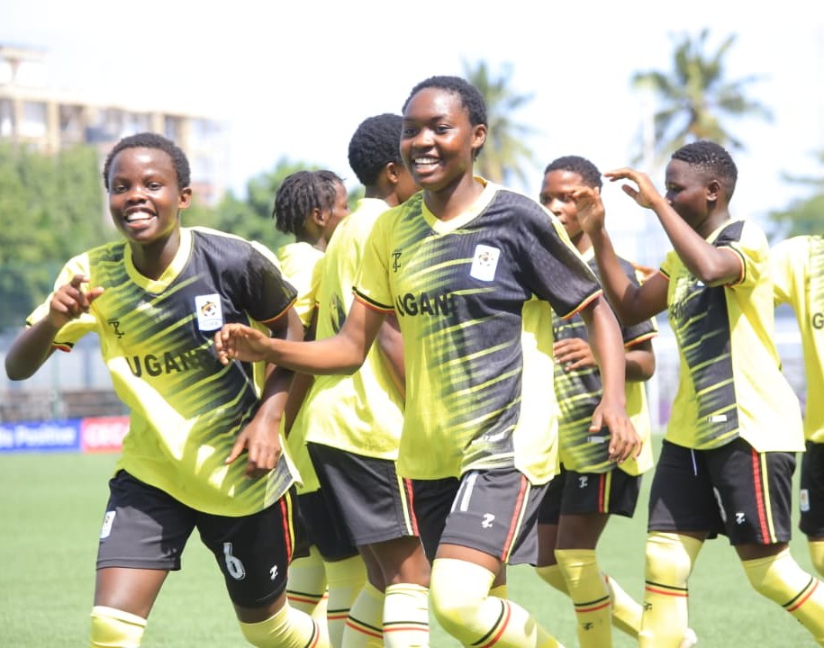 Acen, (middle, Jersey 11) celebrates a goal alongside her Teen Cranes  teammantes